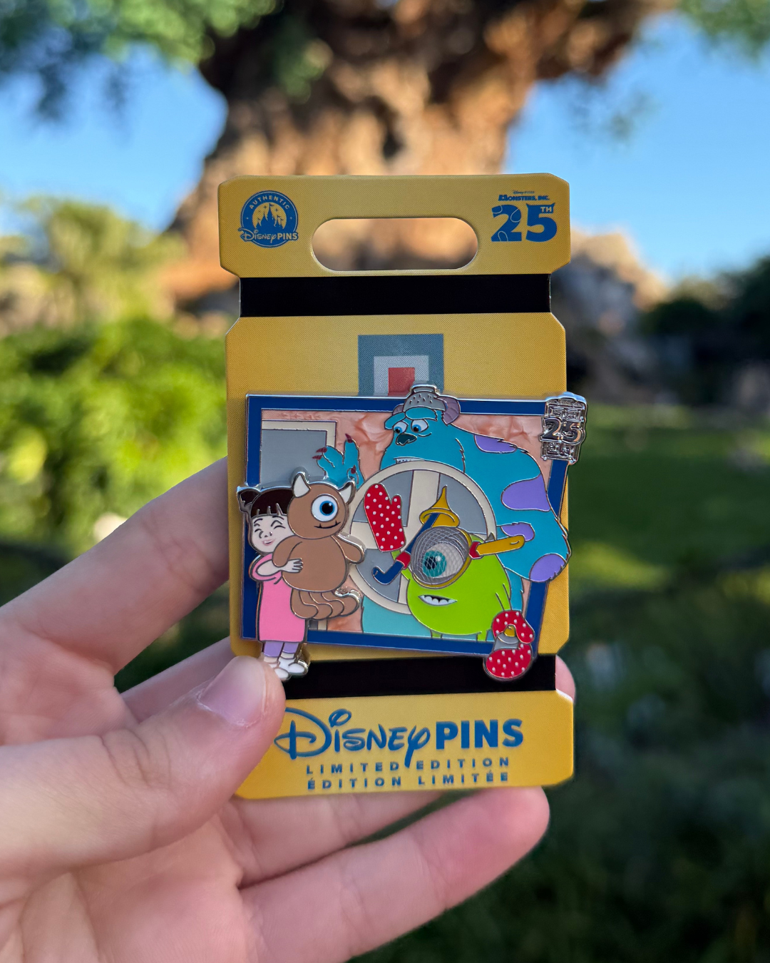 Monsters Inc 25th Limited Edition pin in hand